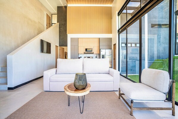 Family Villa | Living area | 55-inch Smart TV with digital channels, smart speakers