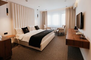 Minibar, individually furnished, desk, laptop workspace