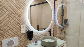 Hair dryer, bidet, towels, soap