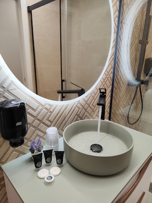 Hair dryer, bidet, towels, soap