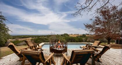 Luxurious property with pool, hot tub, wraparound porch, & two primary suites