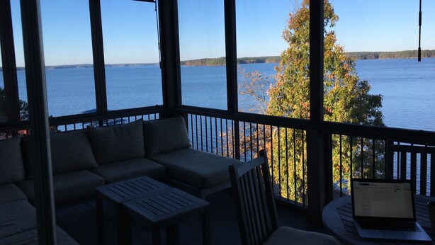 A covered outdoor seating area with a view of a lake and trees. - Amazing lake view and sunsets! Perfect for Masters hosting 2024!

 (Modoc)