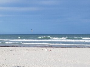 On the beach, sun-loungers, beach towels