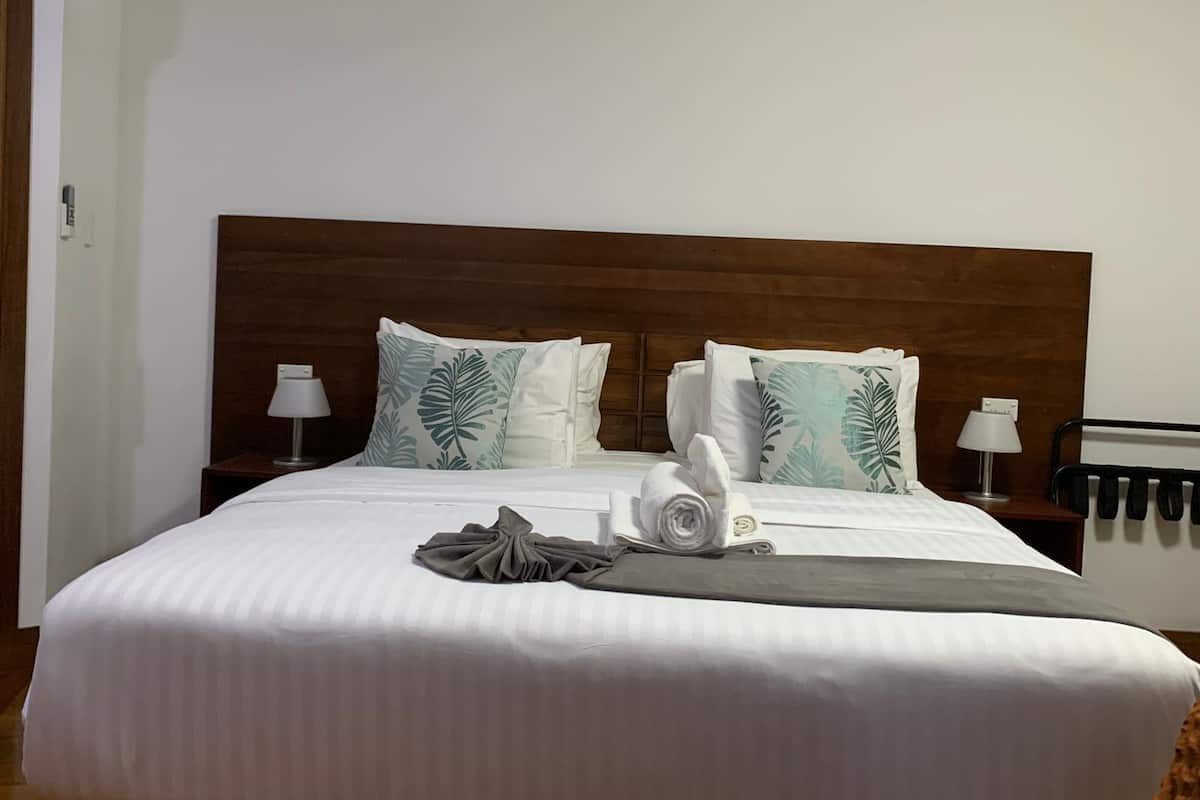 Deluxe Studio Suite, 1 Bedroom, Sea View | Iron/ironing board, free WiFi, bed sheets