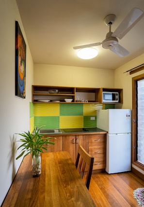 Deluxe Studio Suite, 1 Bedroom, Sea View | Private kitchen | Fridge, microwave, stovetop, toaster