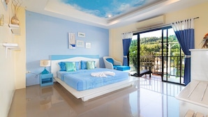A modern bedroom with a large bed, a balcony with a view, and a ceiling with a sky design. - KRABI MORE HOTEL (Krabi)