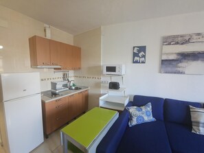 Fridge, microwave, toaster, cookware/dishes/utensils