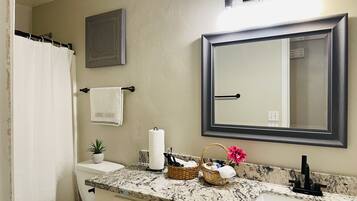 Hair dryer, towels, soap, shampoo