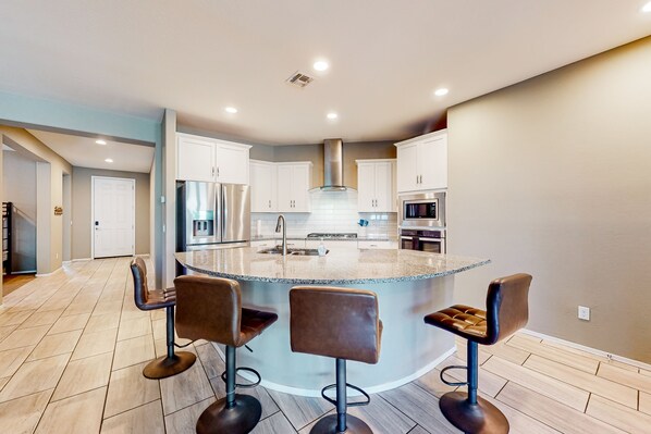 Fridge, microwave, oven, stovetop - Single-story home with enclosed yard, private pool, hot tub, patio, & grill (Goodyear)