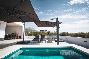 A heated pool - Villa `Just be Happy` by Trawelltopia | Heated Whirl/-Pool · View · AC · WIFI · Parking (Kaštel Stari)