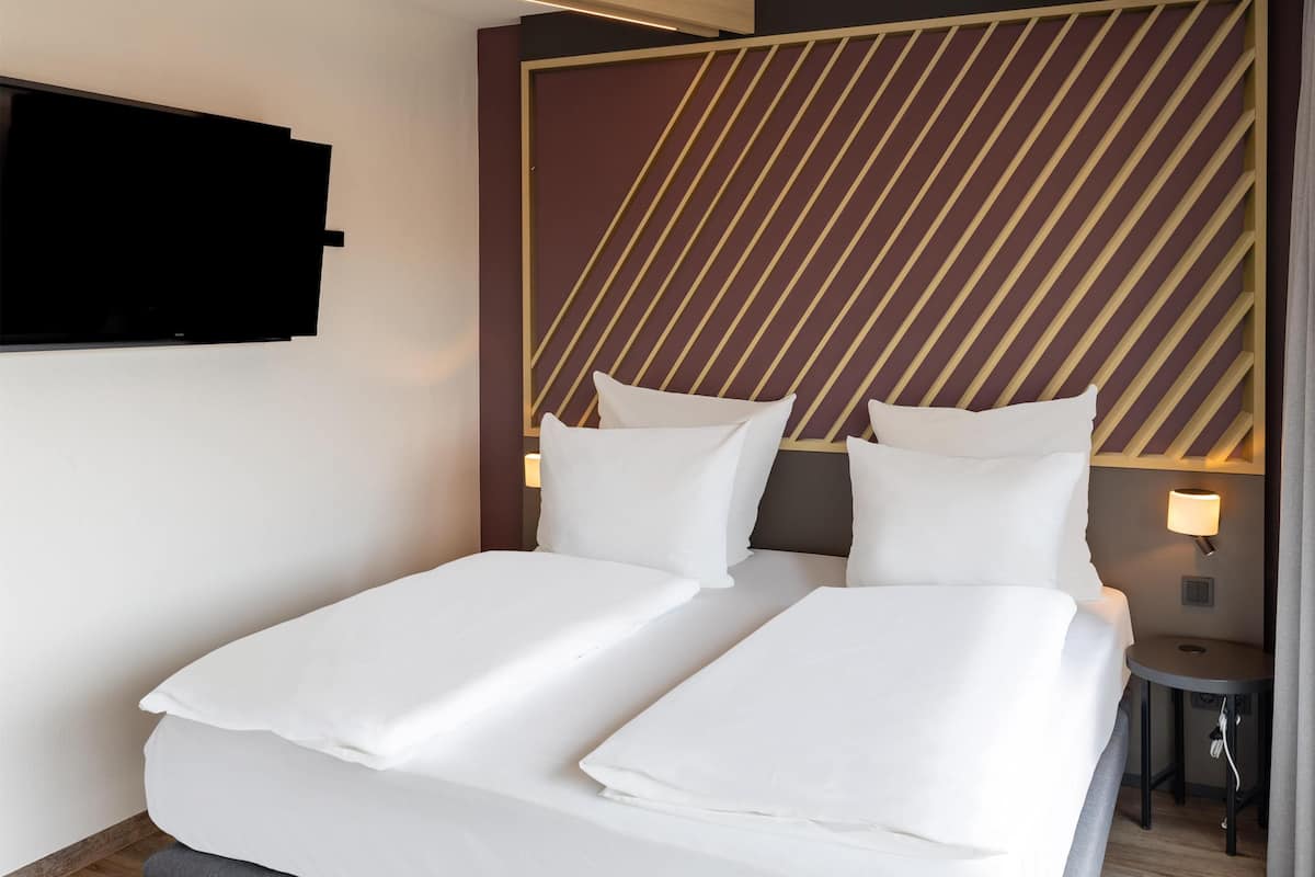 Quarto casal premium | 1 quarto, cortinas blackout, quartos Ć prova de som, Wi-Fi de cortesia