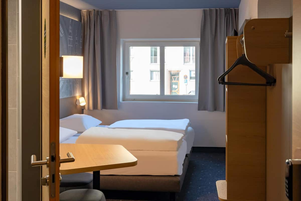 Quarto duplo | 1 quarto, cortinas blackout, quartos Ć prova de som, Wi-Fi de cortesia
