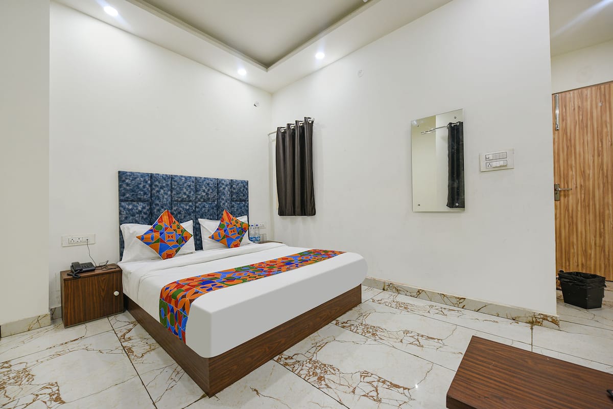 Deluxe kamer | Lakens van Egyptisch katoen, luxe beddengoed, een kluis op de kamer