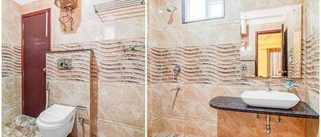 A bathroom with a marble floor, a white toilet, a sink with a marble countertop, and a wall-mounted towel rack.
