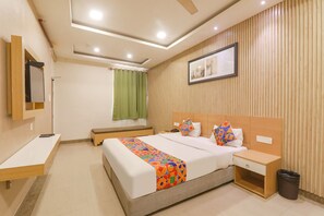 Family Room | Egyptian cotton sheets, premium bedding, in-room safe, soundproofing - Fabhotel Raghubar Kripa (Lucknow)