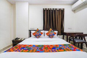Deluxe kamer | Lakens van Egyptisch katoen, luxe beddengoed, een kluis op de kamer