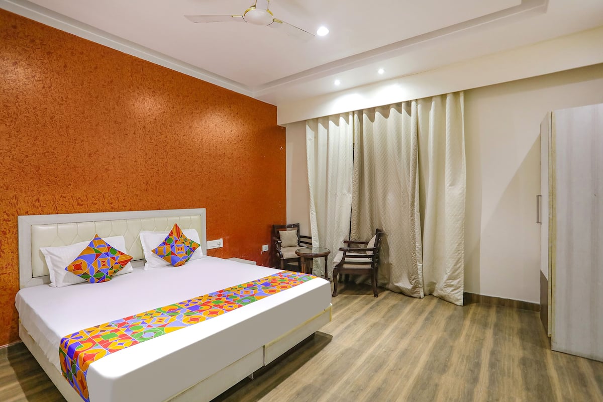 Deluxe kamer | Lakens van Egyptisch katoen, luxe beddengoed, een kluis op de kamer