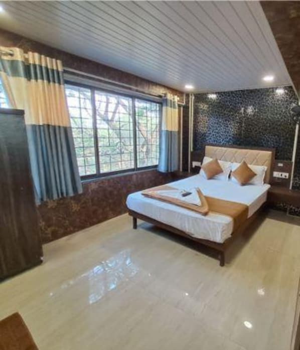 Habitación Deluxe | Sábanas de algodón egipcio y ropa de cama de alta calidad 