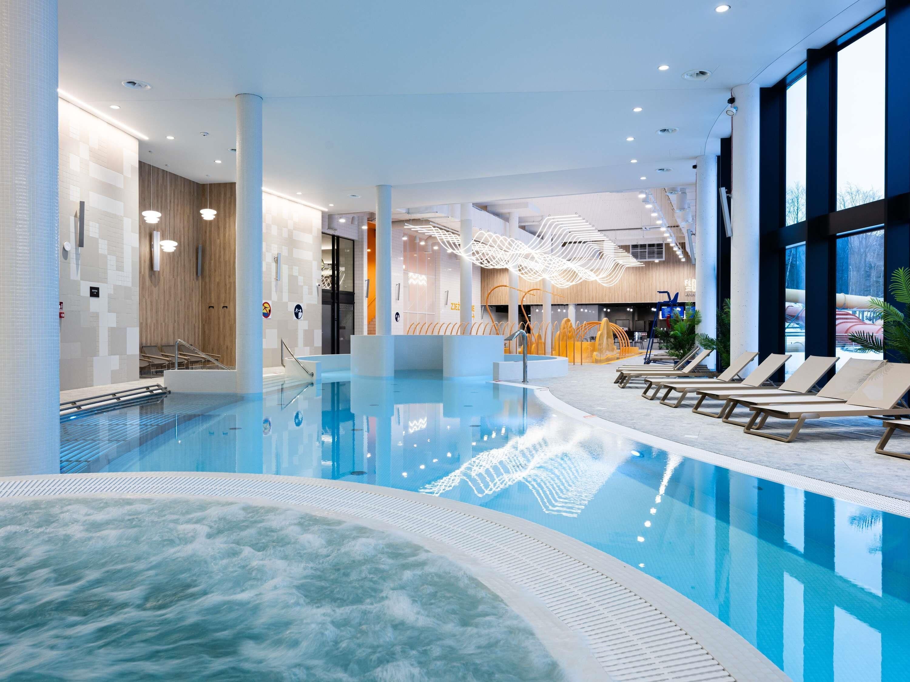 2 indoor pools, open 8:00 AM to 10:00 PM, pool loungers