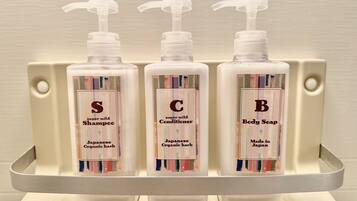 Hair dryer, towels, soap, toilet paper