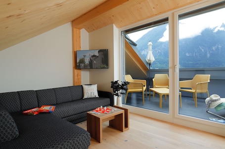 Premium Duplex, 2 Bedrooms | Living area | LED TV, heated floors
