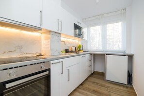 디럭스 아파트 | 전용 주방 | 미니 냉장고, 전자레인지, 오븐, 쿡탑