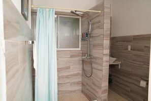 Villa | Bathroom | Shower, hair dryer, bathrobes, towels - Villa Serenity, Water View Suite, Sleeps 3 w/ Pool (Providenciales)