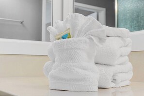 Hair dryer, towels, soap, toilet paper