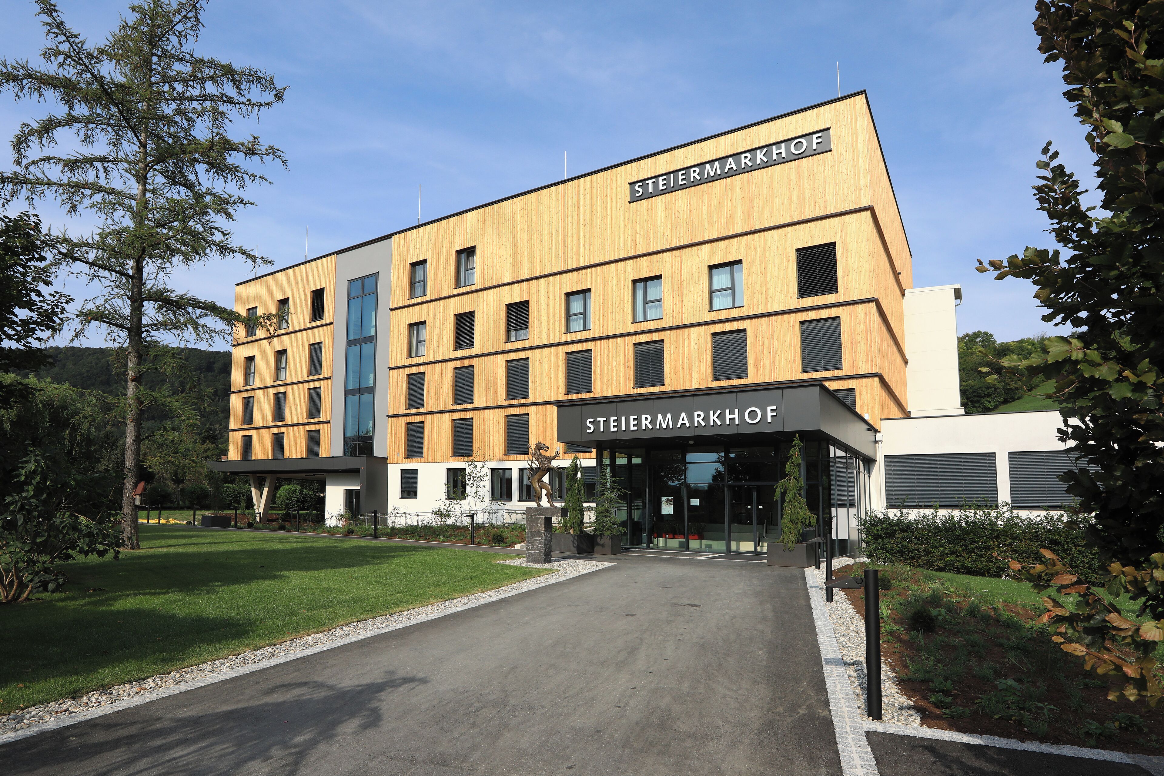 A modern building with a sign reading "STEIERMARKHOF".
