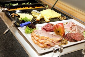Daily buffet breakfast (EUR 14 per person)