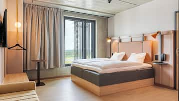 Standard Room, 1 King Bed | Laptop workspace, soundproofing, cribs/infant beds, WiFi