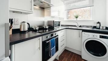 Apartment | Private kitchen | Fridge, microwave, oven, stovetop