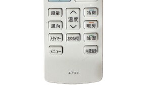 A white Sharp brand thermostat with a digital display showing 22°C. - 51Cozy Forest】 Very close Namba Doutonbori Nippombashi Kuromon Wi-Fi◎ (大阪市)