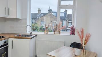 Apartment | Private kitchen | Fridge, oven, stovetop, dishwasher