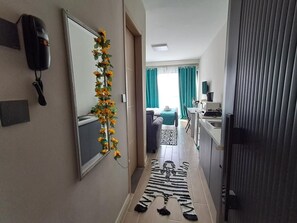 1 habitación, colchones Tempur-Pedic y tabla de planchar con plancha 
