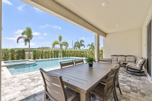 Outdoor dining - Last Minute Disney! Private Pool, Hot Tub, Game Room & Themed Bedrooms. Book Now! #96895 (Orlando)