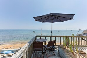 Outdoor dining - 1BR Partial Water View / Beach Access + Sun Deck (Provincetown)