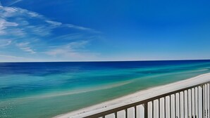 A beach view with clear skies and a calm sea. - Shores of Panama III by Resort Collection (Panama City Beach)