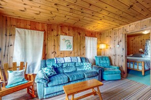 Living area - Charming lakefront cottage with large yard, dock, & fire pit - close to downtown (Topinabee)