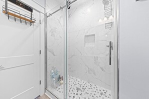 Shower, hair dryer, towels
