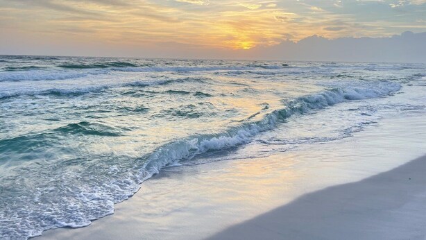 A beach with waves and a sunset. - Florida Cottage | Fenced Yard | Its All Good | Santa Rosa Beach (Santa Rosa Beach)