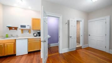 Fridge, microwave, stovetop, coffee/tea maker