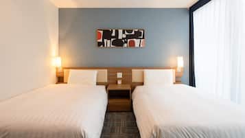 A hotel room with two beds, a modern headboard, a wall-mounted abstract art piece, and a window with curtains.