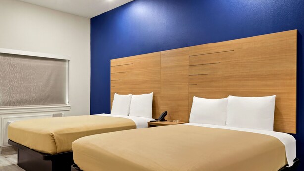 Basic Room, 2 Queen Beds, Non Smoking | 1 bedroom, iron/ironing board, WiFi (free) - Scottish Inn Parker (Houston)