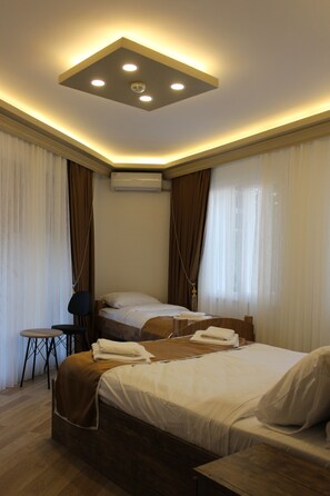 Family Double or Twin Room, Partial Sea View, Sea Facing | Desk, laptop workspace, soundproofing, free WiFi - Vento (Istanbul)