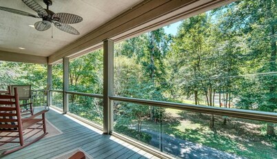 "River Paradise!" Luxury waterfront home situated on beautiful Hiawassee River.