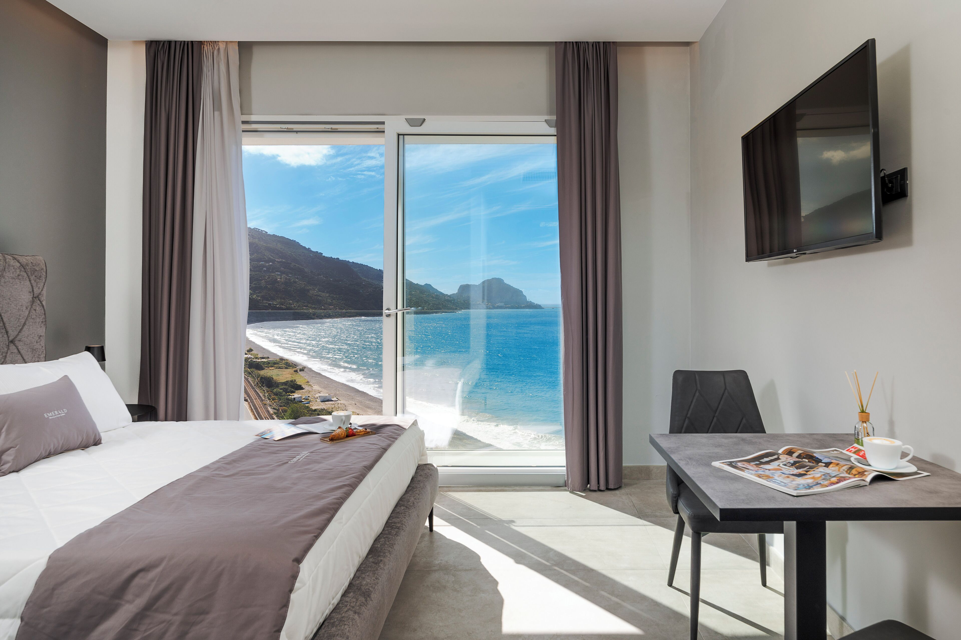 Habitación Deluxe, vista al mar | Sábanas de algodón egipcio, ropa de cama de alta calidad y edredón 