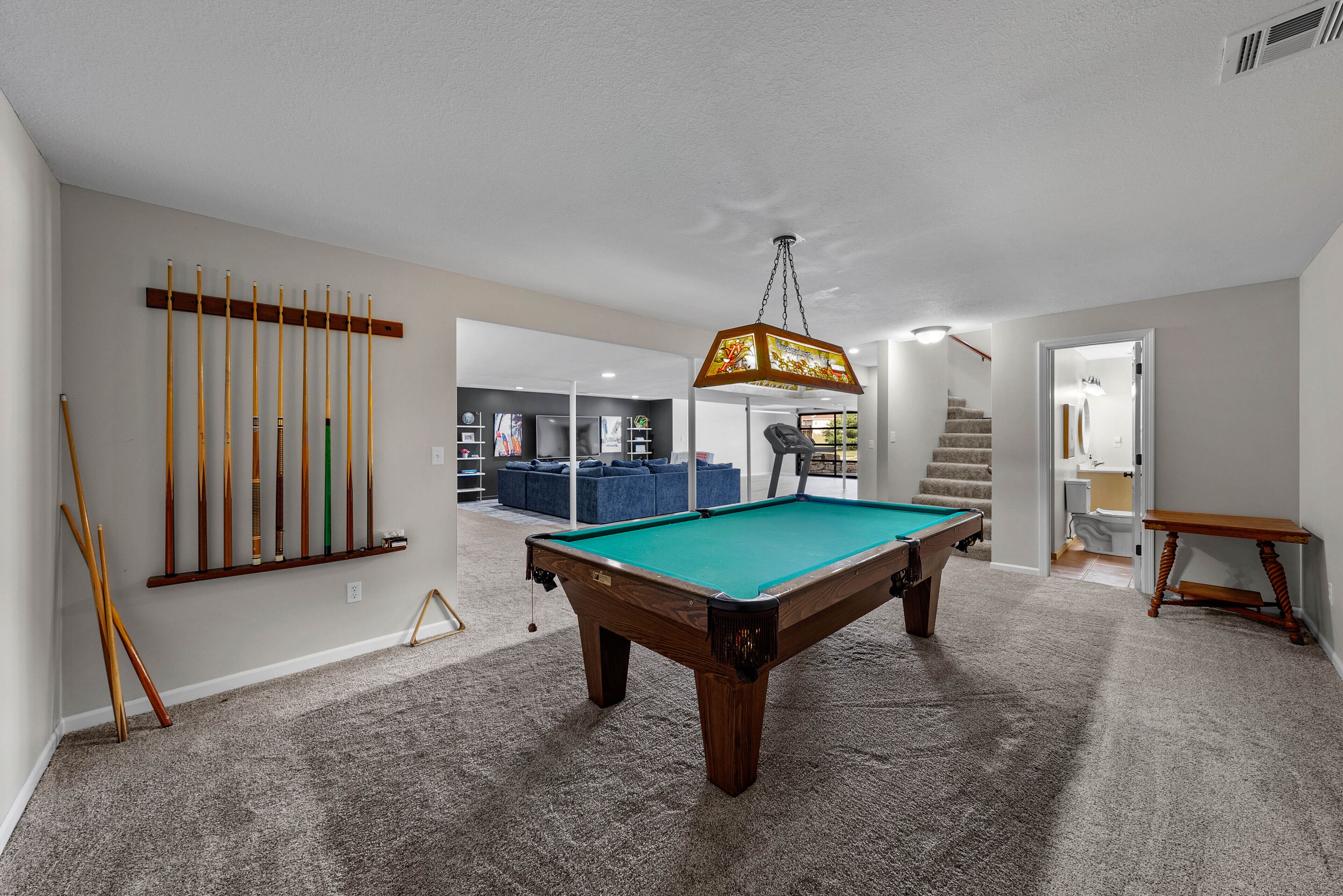 Pool table in the basement entertainment area