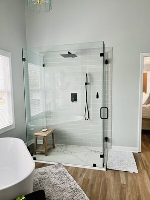 Shower, hair dryer, towels, toilet paper