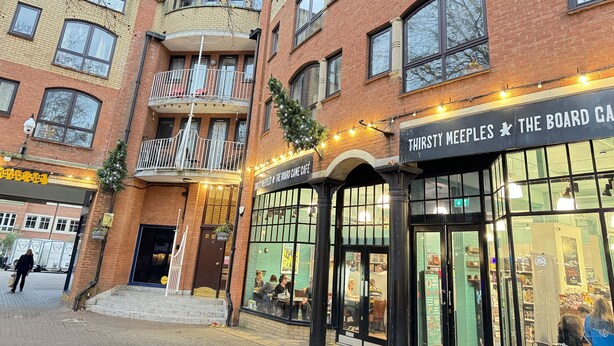 A multi-story building with a ground-floor board game café. - Spires View | Oxford Holiday Let | 1 Bed & Sleeps 2 (Oxford)
